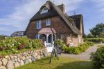 Appartement-Vermietung Bals - Ferienhaus Meeresrauschen - Im Grund 18d | Sylt | Wenningstedt, Reetdachhaus für 2 Personen mit 1 Schlafzimmer, 2 Badezimmer, Gäste WC, ca. 135 m2, Grundstück ca. 0 m2